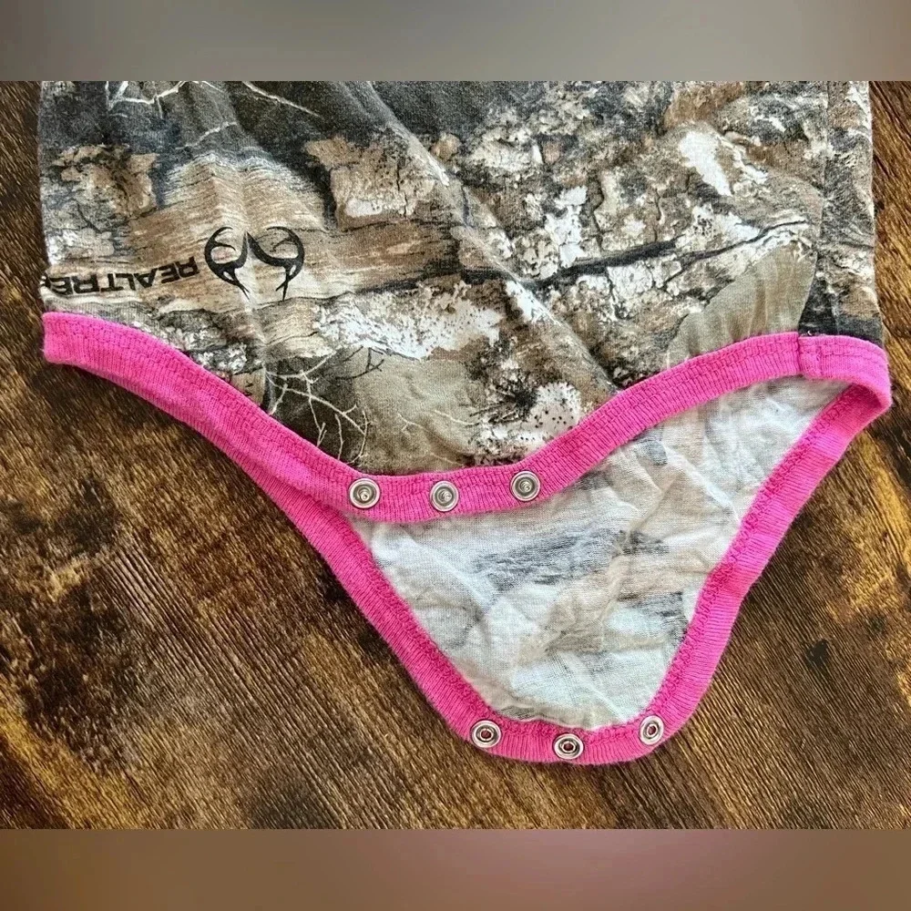 REALTREE | baby girl camouflage onesie. Size: 24M​